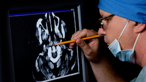Medical Student Observing Image of Brain